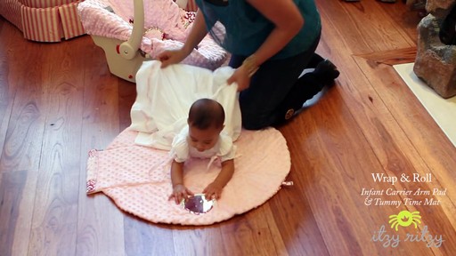 Itzy Ritzy Wrap & Roll Infant Carrier Pad and Mat - image 5 from the video