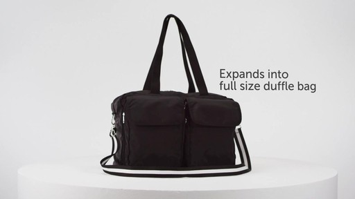 Sacs Collection by Annette Ferber Double Pocket Duffle Canvas - eBags.com - image 2 from the video
