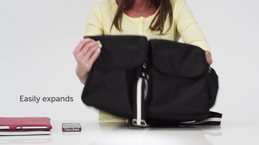 Sacs Collection by Annette Ferber Double Pocket Duffle Canvas - eBags.com - image 5 from the video