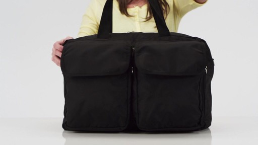 Sacs Collection by Annette Ferber Double Pocket Duffle Canvas - eBags.com - image 6 from the video
